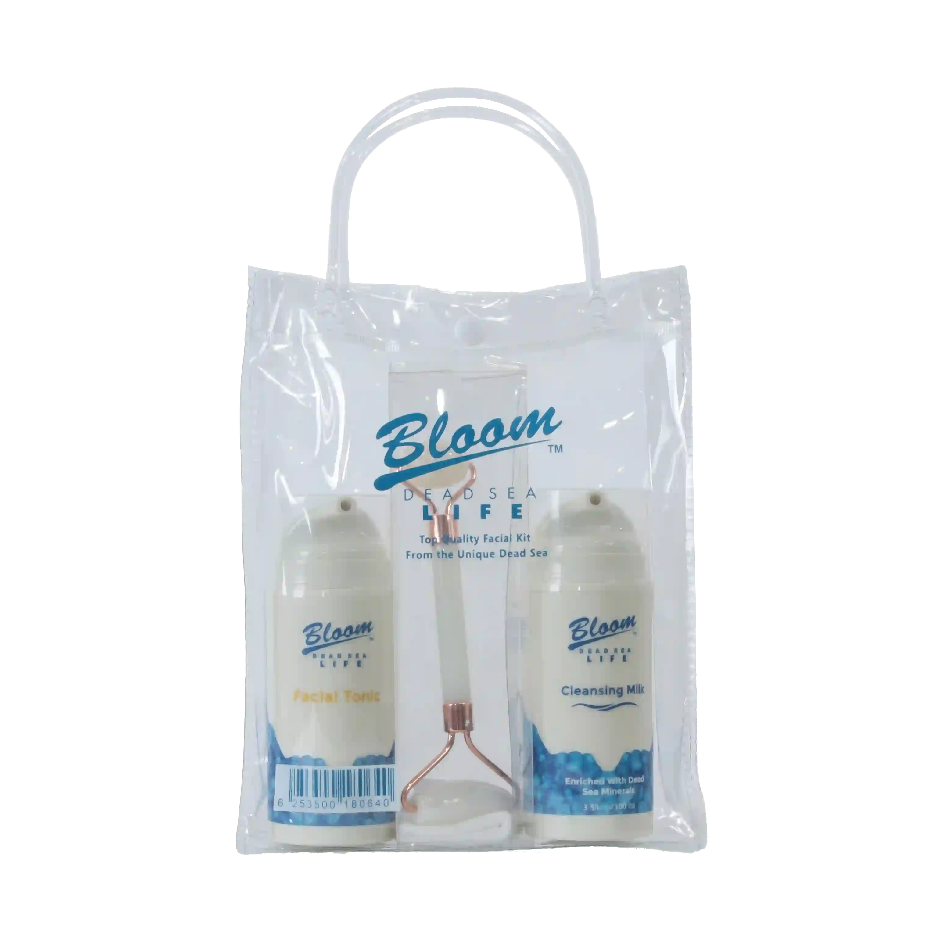 Bloom Dead Sea Facial Kit featuring cleansing milk, facial tonic, and a massage roller for a complete skincare routine