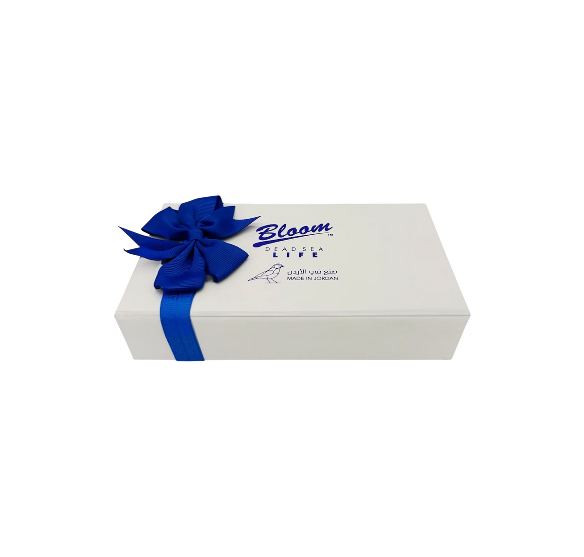 Bloom Dead Sea Life luxury white gift box with gold interior opened next to mineral hand cream and nail buffer