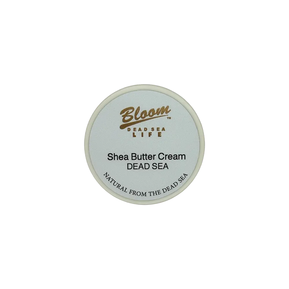 Applying nourishing Dead Sea Shea Butter onto dry skin for deep hydration